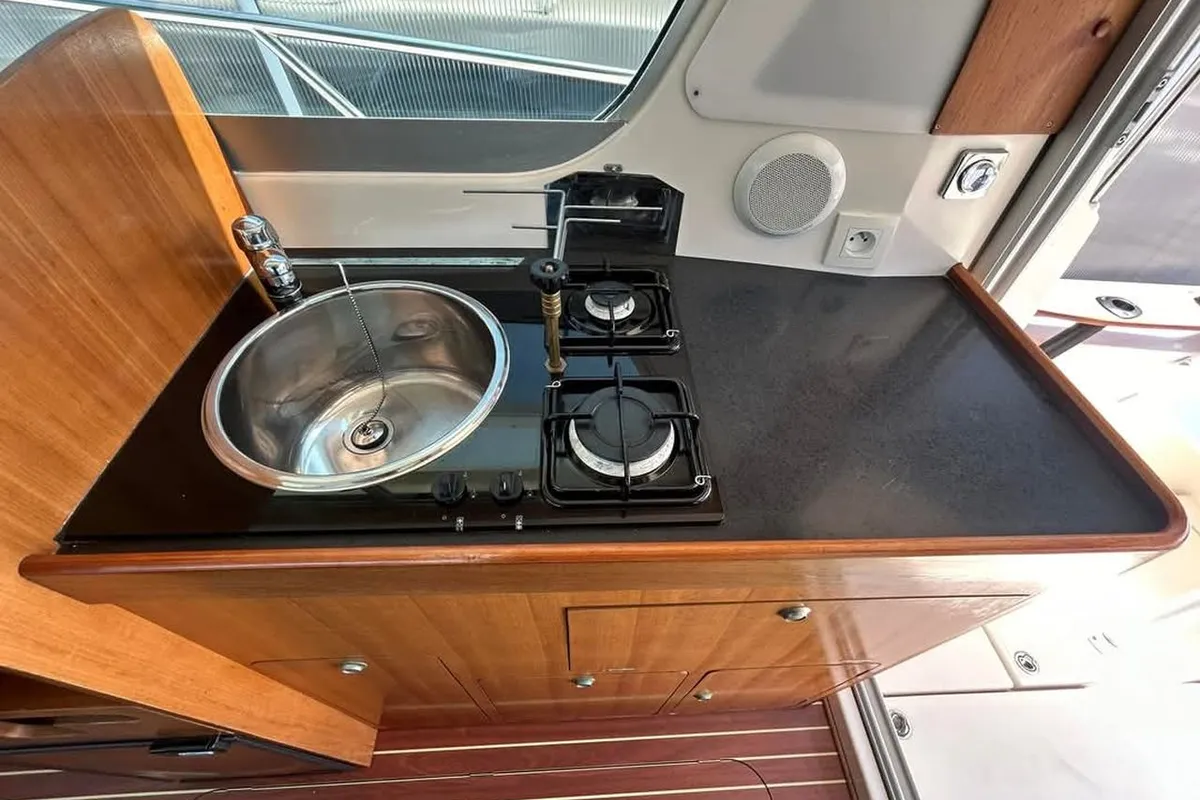Galley of Range Cruiser, a Ocqueteau 815 Range Cruiser motorboat at Općina Pakoštane, Croatia