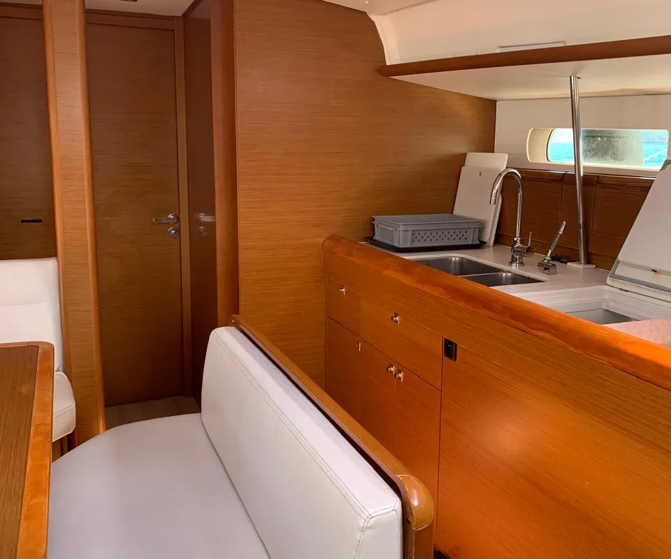 Salon of Aquaholic, a Jeanneau Sun Odyssey 519 sailboat at Municipal Unit of Ellomenos, Greece