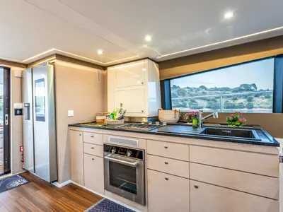Galley of Nyd'amour II, a Aventura 14 Power catamaran at Kranidi, Greece