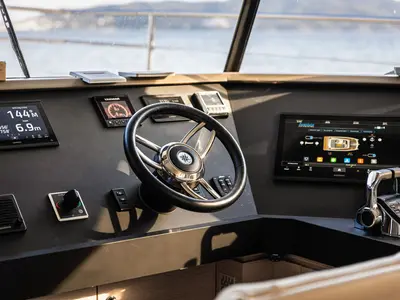 Cockpit of Nyd'amour II, a Aventura 14 Power catamaran at Kranidi, Greece