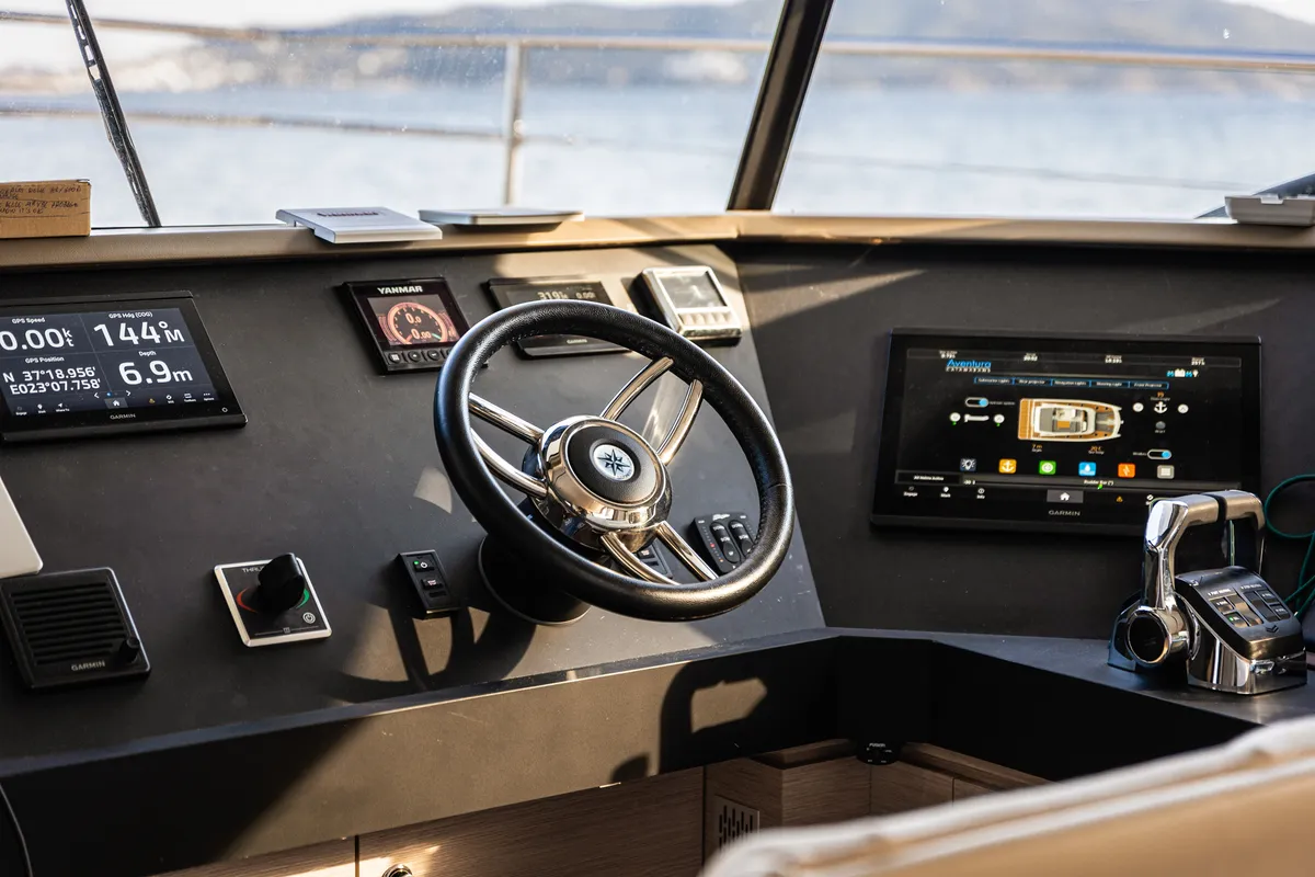 Cockpit of Nyd'amour II, a Aventura 14 Power catamaran at Kranidi, Greece