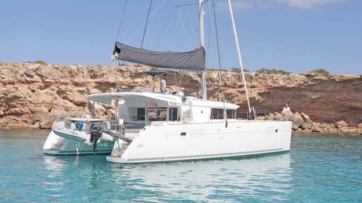 Exterior view of Atlantis, a Lagoon 440 catamaran at Santa Eulària des Riu, Spain