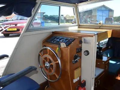 Cockpit of South Pacific, a De Drait Doerak 850 OK motorboat at Drachten, Netherlands