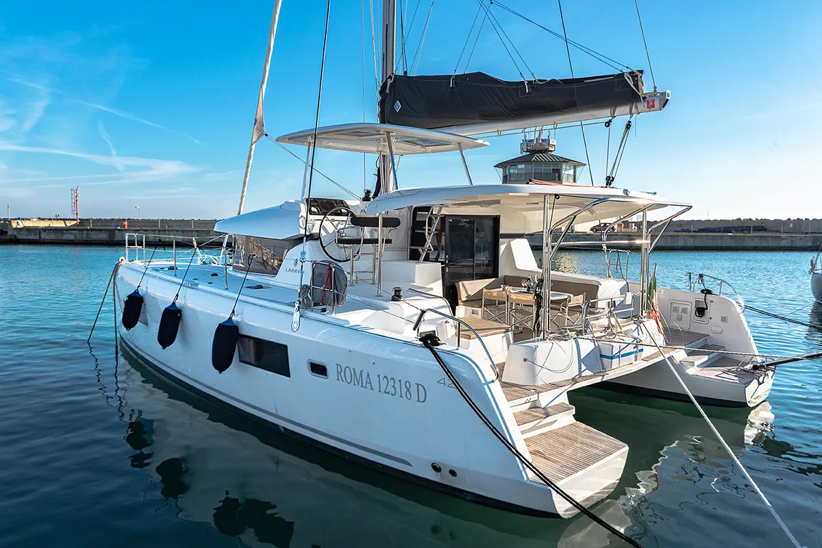 Exterior view of Beatrix, a Lagoon 42 catamaran at Cagliari, Italy