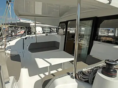 Deck of Bronze Kiss, a Excess 11 - 4 + 1 + 1 cab. catamaran at Split, Croatia