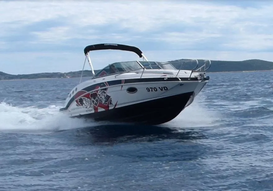 Exterior view of Triple X, a Chaparral 225 SSi Cuddy motorboat at Tribunj, Croatia