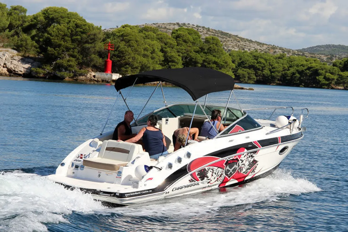 Exterior view of Triple X, a Chaparral 225 SSi Cuddy motorboat at Tribunj, Croatia