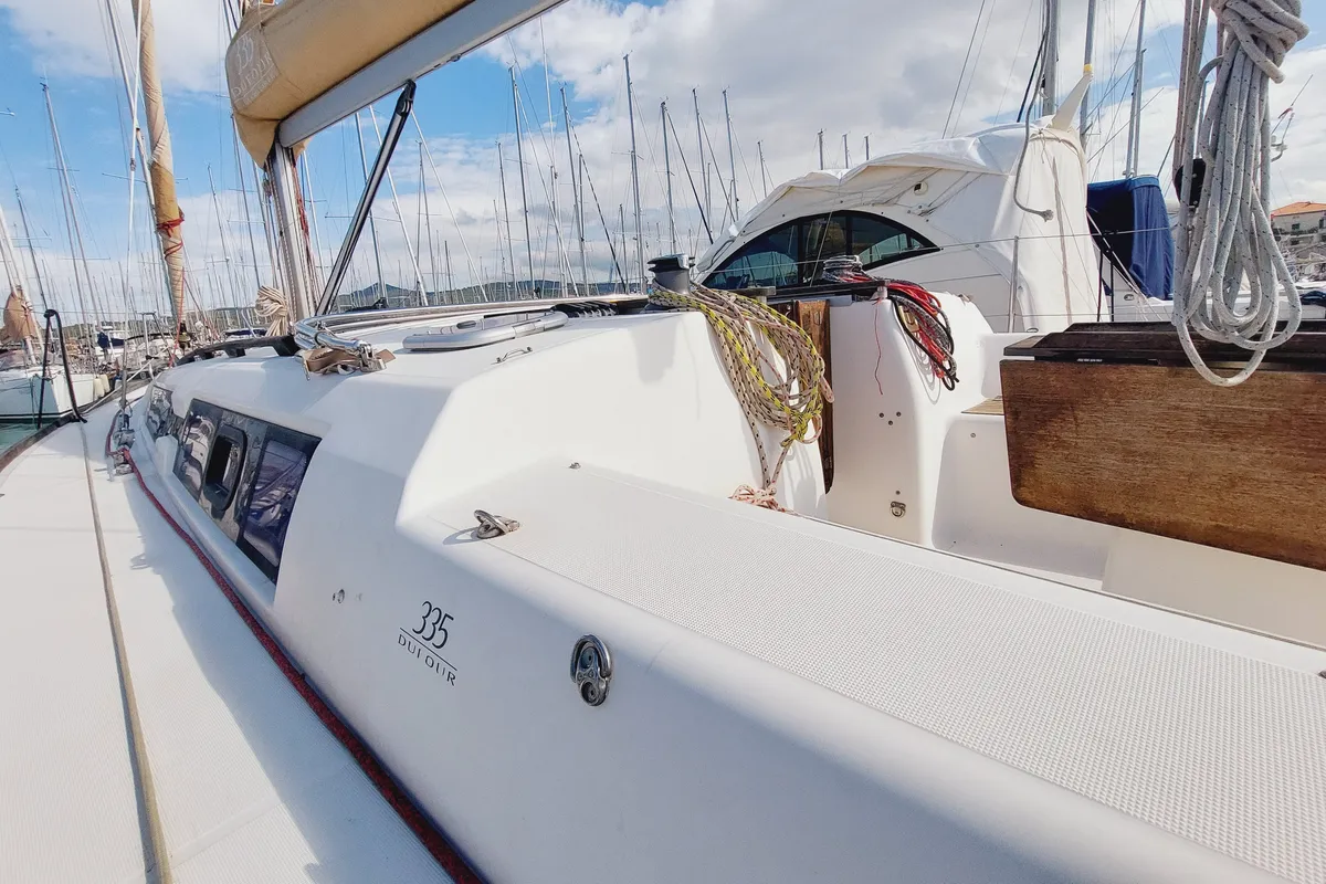 Deck of Caprice 2, a Dufour 335 Grand Large sailboat at Rosignano Solvay, Italy