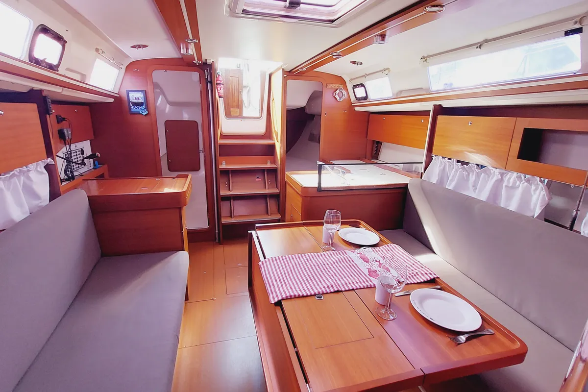 Salon of Caprice 2, a Dufour 335 Grand Large sailboat at Rosignano Solvay, Italy
