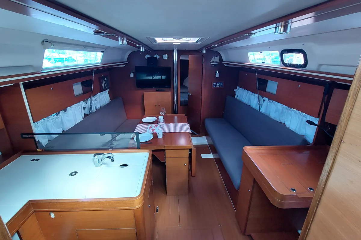 Salon of Caprice 2, a Dufour 335 Grand Large sailboat at Rosignano Solvay, Italy