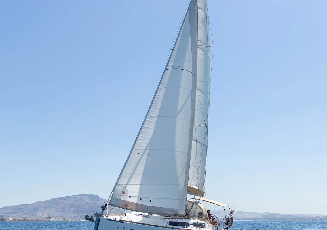 Exterior view of Caprice 2, a Dufour 335 Grand Large sailboat at Rosignano Solvay, Italy