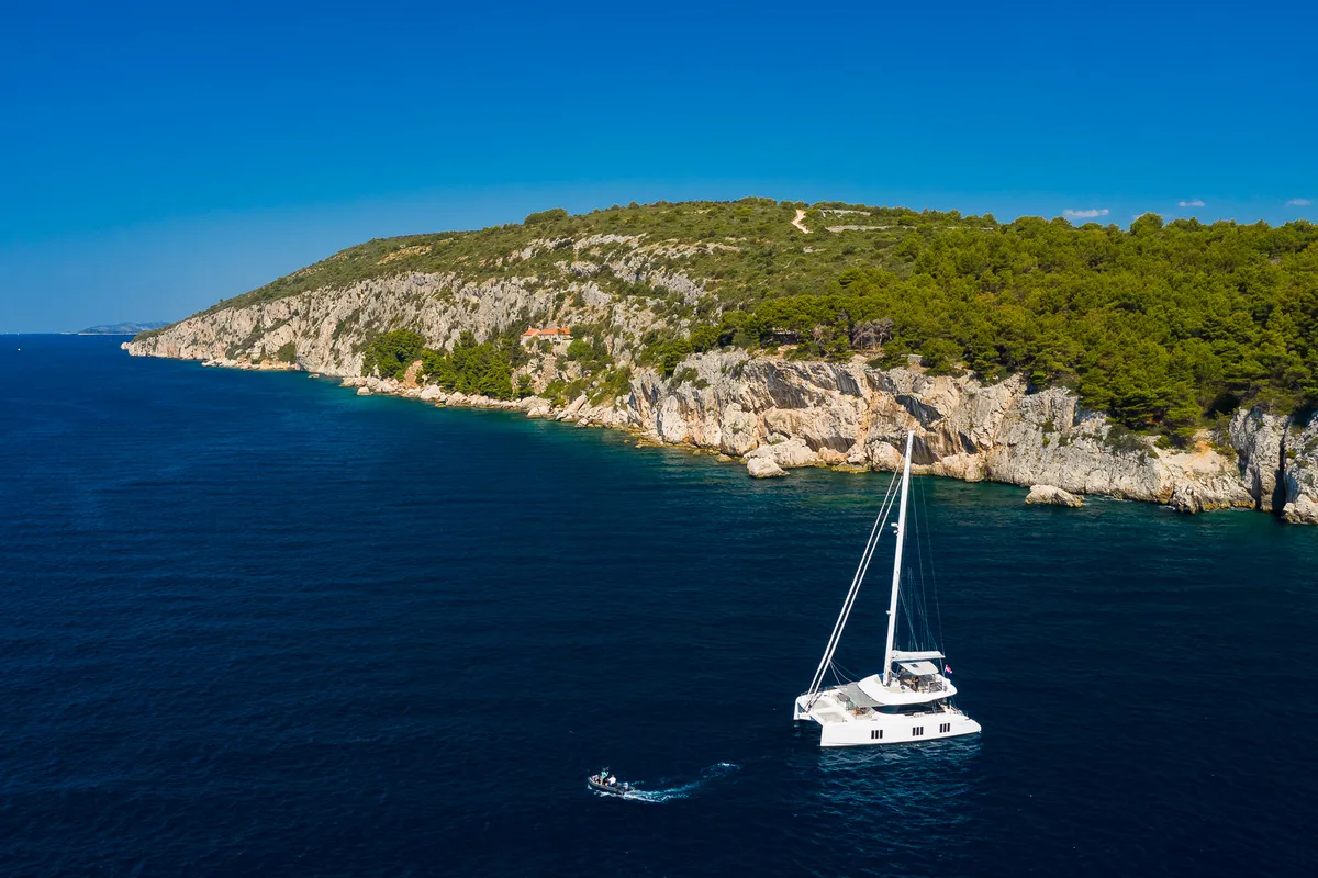 Exterior view of Solitaire, a Sunreef 50 catamaran at Grad Kaštela, Croatia