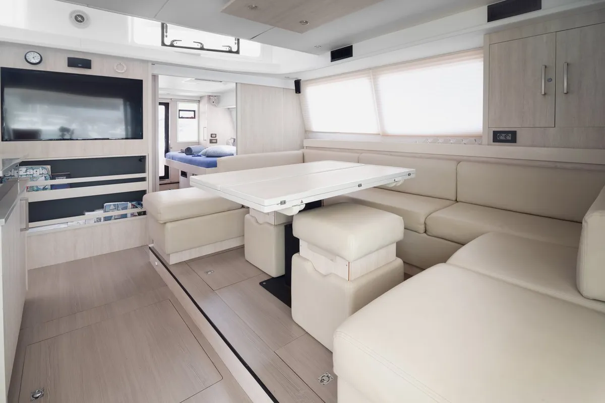 Salon of Between, a Leopard 58 catamaran at Roche Caiman, Seychelles