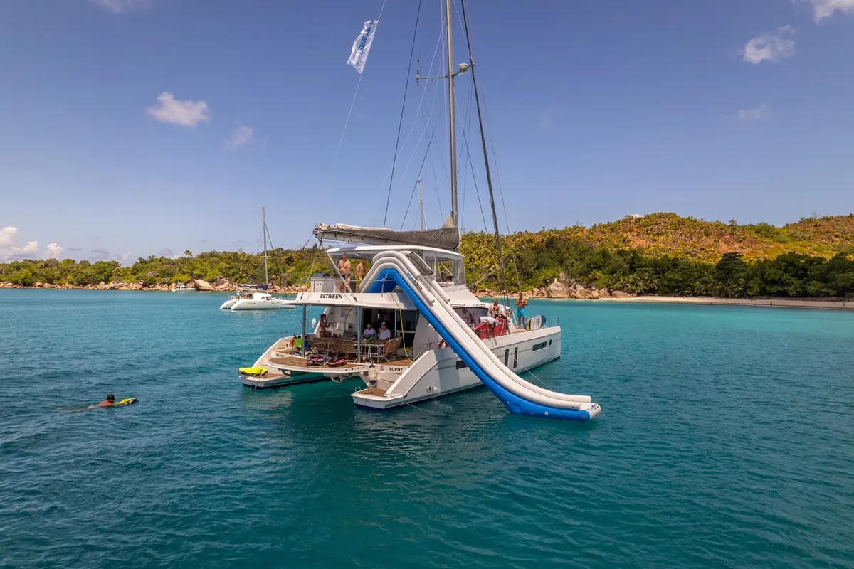 Exterior view of Between, a Leopard 58 catamaran at Roche Caiman, Seychelles