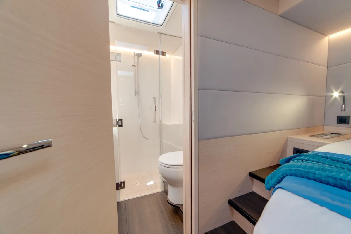 Cabin on Chilli, a Lagoon 55 catamaran at Olbia, Italy