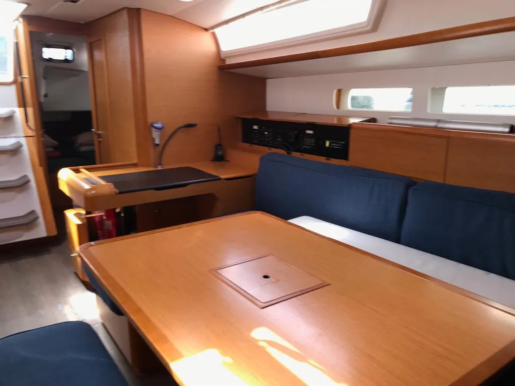 Salon of Alboran Cognac (Majorca), a Jeanneau Sun Odyssey 519 sailboat at es Jonquet, Spain