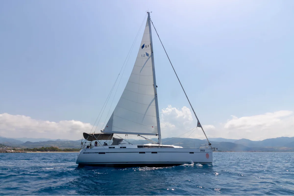 Exterior view of Marzia, a Bavaria Cruiser 51 sailboat at Cannigione, Italy