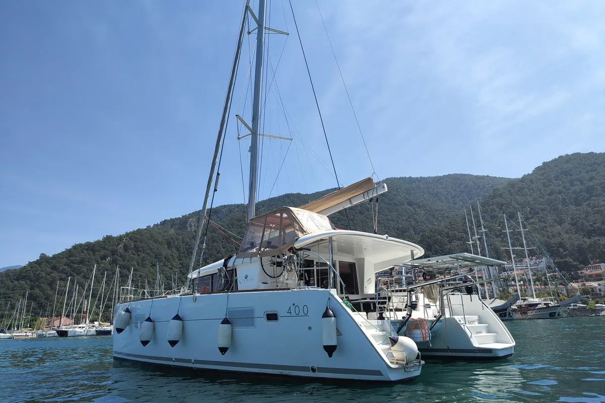 Exterior view of Santi, a Lagoon 400 catamaran at Fethiye, Turkey