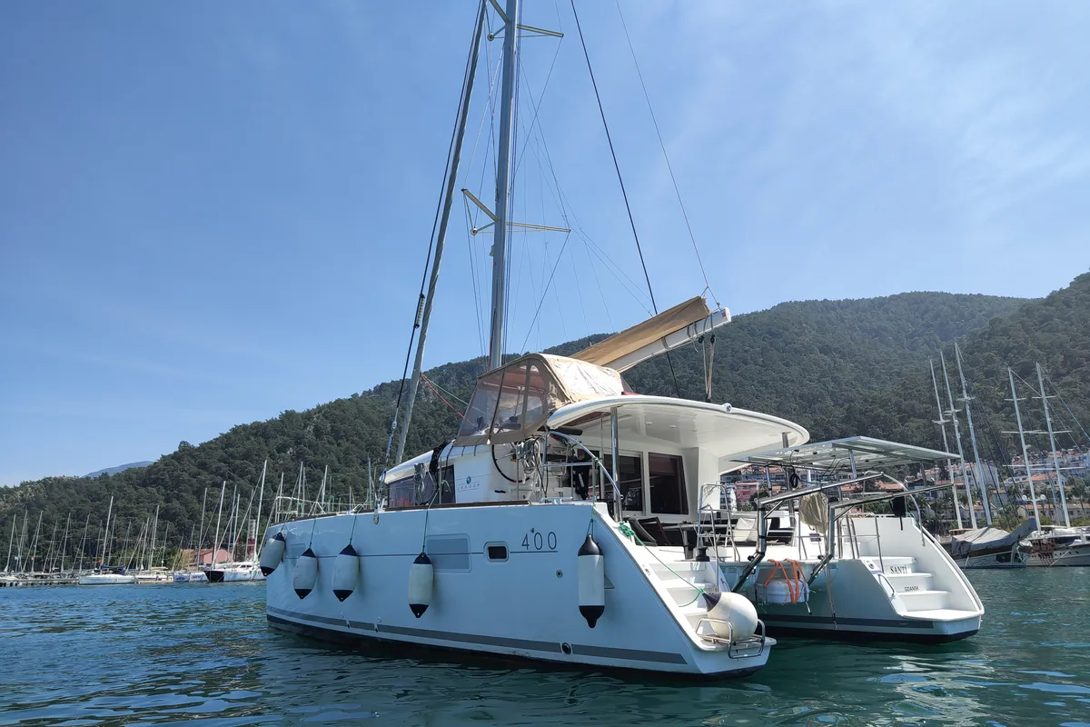 Exterior view of Santi, a Lagoon 400 catamaran at Fethiye, Turkey