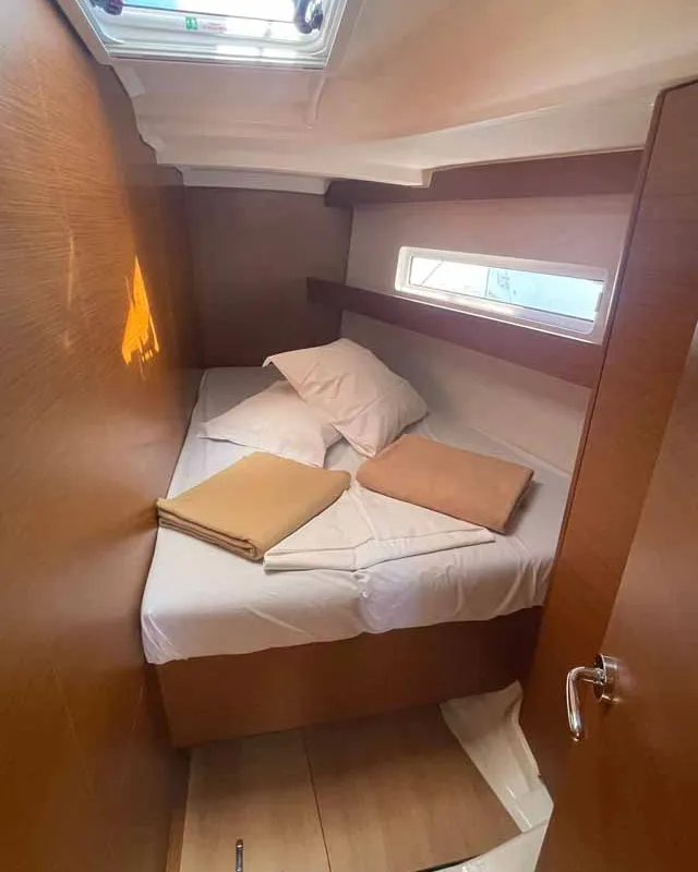Cabin on Sweet Dreams, a Jeanneau Sun Odyssey 440 sailboat at Figari/Golfo Aranci, Italy