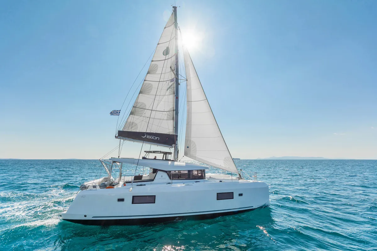 Exterior view of Wind Whisper, a Lagoon 42 catamaran at Parikia, Greece