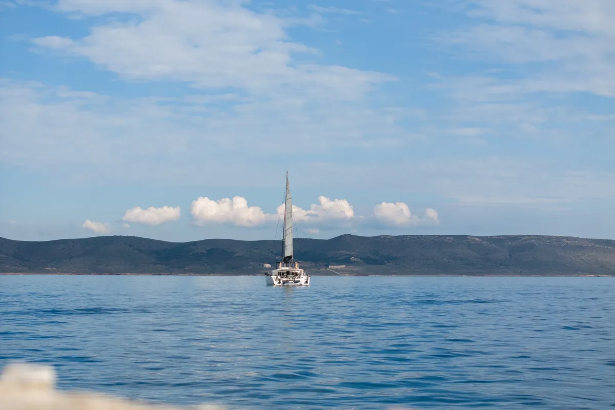 Exterior view of MADICON, a Lagoon 450 Fly catamaran at Parikia, Greece