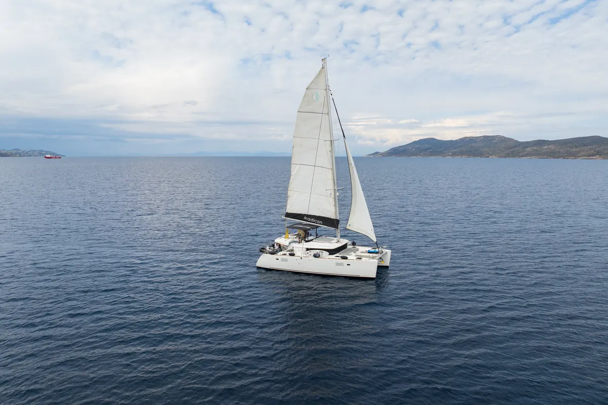 Exterior view of MADICON, a Lagoon 450 Fly catamaran at Parikia, Greece