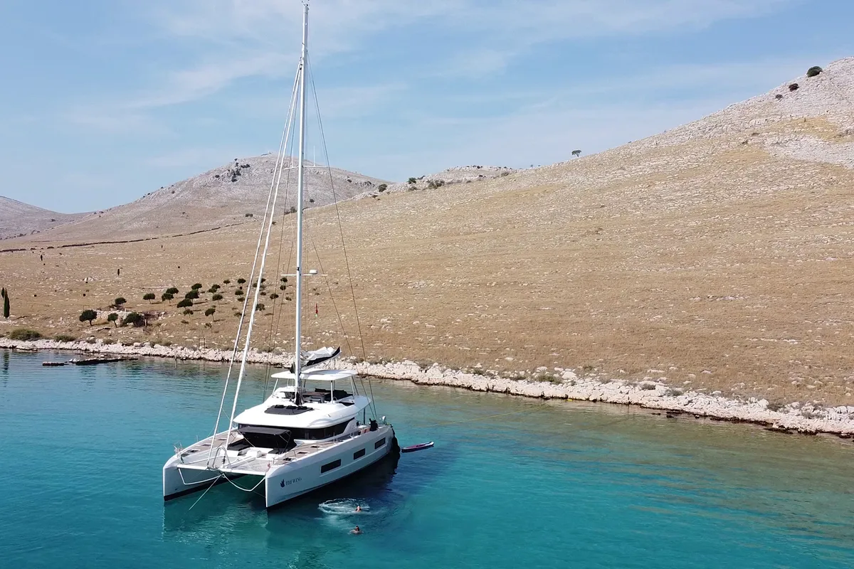 Exterior view of Tri Wing, a Lagoon 55 catamaran at Grad Kaštela, Croatia