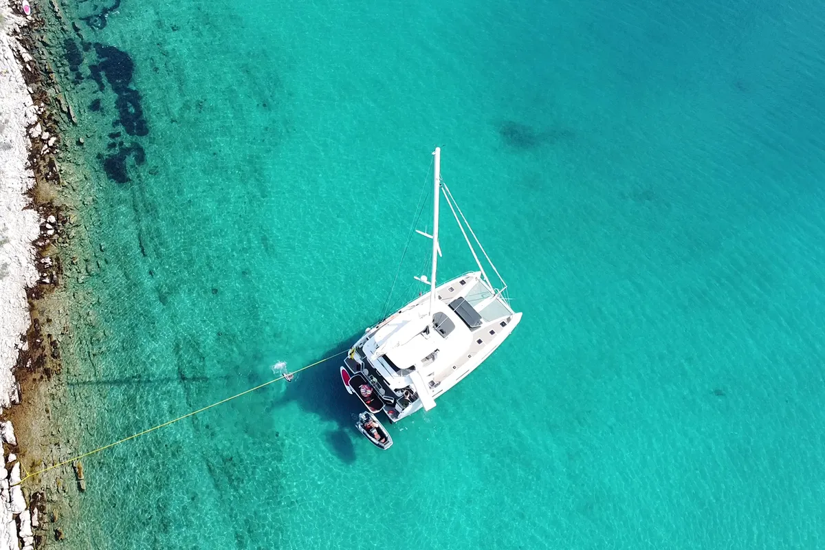Exterior view of Tri Wing, a Lagoon 55 catamaran at Grad Kaštela, Croatia
