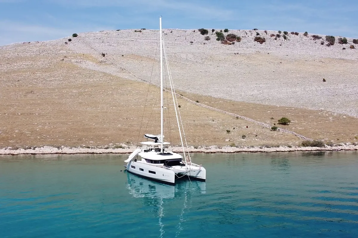 Exterior view of Tri Wing, a Lagoon 55 catamaran at Grad Kaštela, Croatia