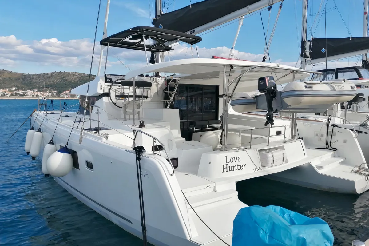 Exterior view of Love Hunter, a Lagoon 42 catamaran at Grad Kaštela, Croatia