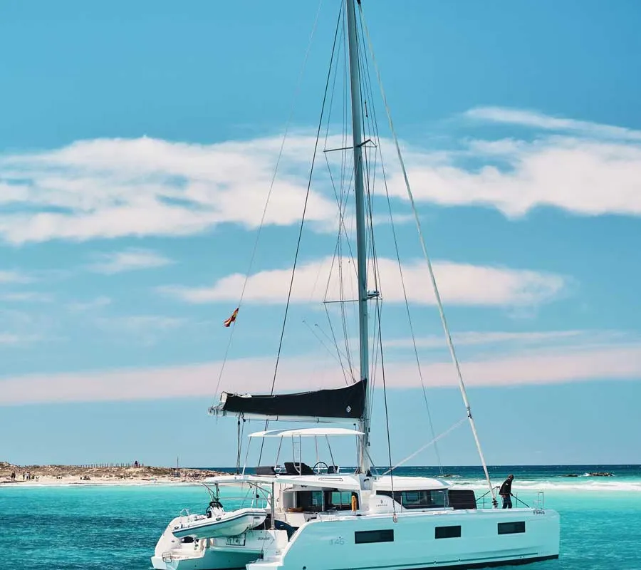 Exterior view of Invalid, a Lagoon 46 catamaran at Sant Antoni de Portmany, Spain