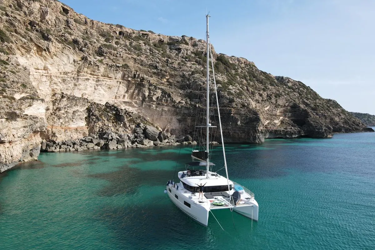 Exterior view of Invalid, a Lagoon 46 catamaran at Sant Antoni de Portmany, Spain