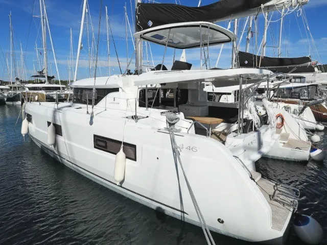 Exterior view of Invalid, a Lagoon 46 catamaran at Sant Antoni de Portmany, Spain