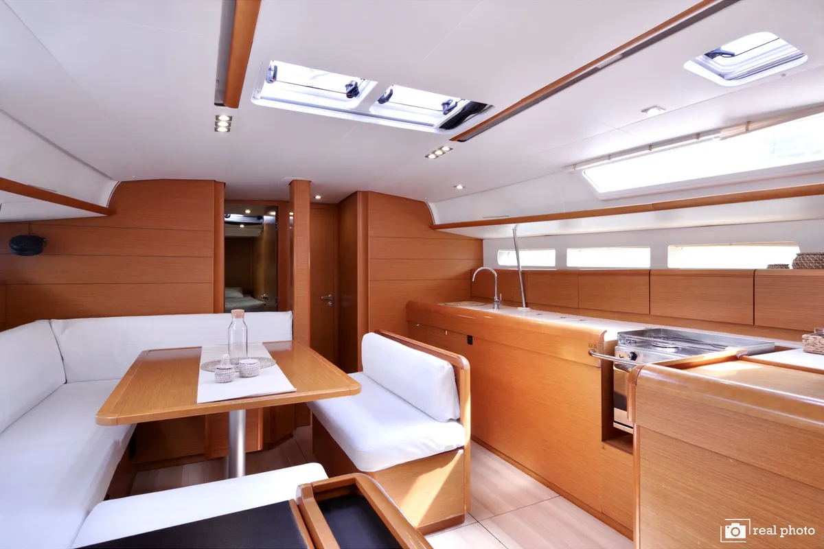 Salon of Bianca - Water maker, Solar Panel, a Jeanneau Sun Odyssey 519 sailboat at Puntone di Scarlino, Italy