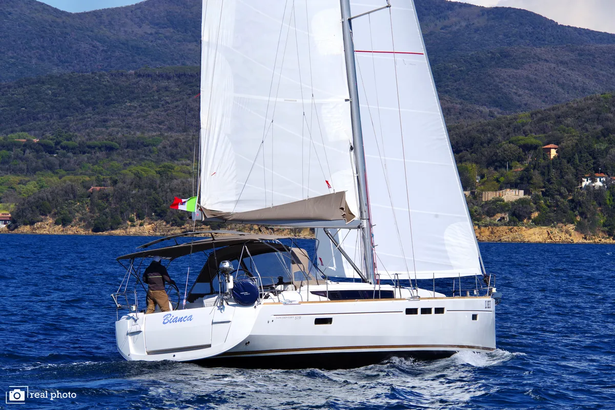 Exterior view of Bianca - Water maker, Solar Panel, a Jeanneau Sun Odyssey 519 sailboat at Puntone di Scarlino, Italy