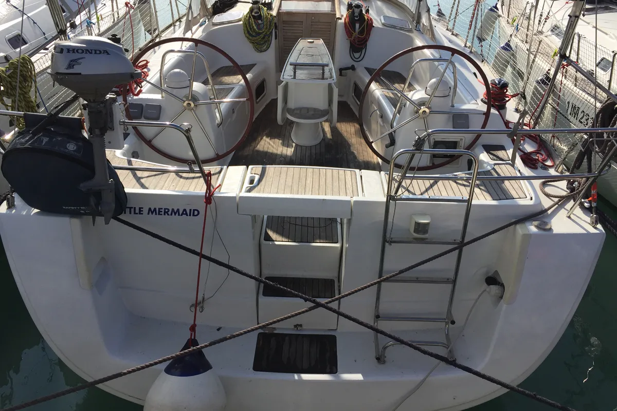 Exterior view of Little Mermaid, a Beneteau Oceanis 43 sailboat at Olbia, Italy