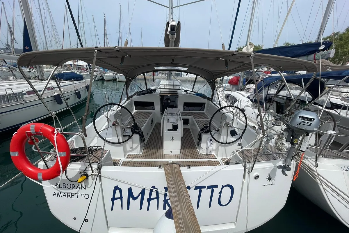 Exterior view of Alboran Amaretto, a Jeanneau Sun Odyssey 440 sailboat at es Jonquet, Spain
