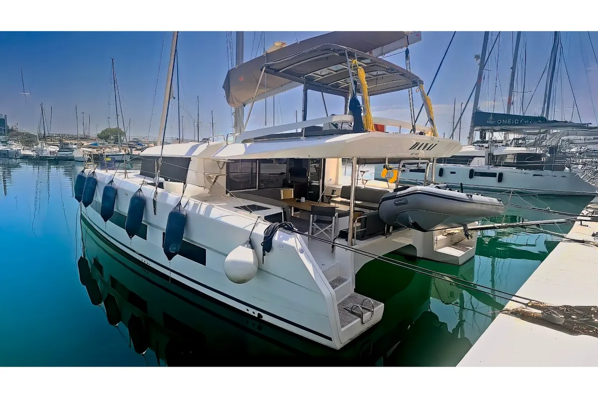 Exterior view of Duplo II, a Dufour Catamaran 48 catamaran at Agios Stefanos, Greece