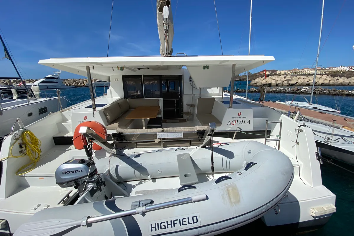 Exterior view of Aquila, a Fountaine Pajot Lucia 40 catamaran at San Miguel de Abona, Spain