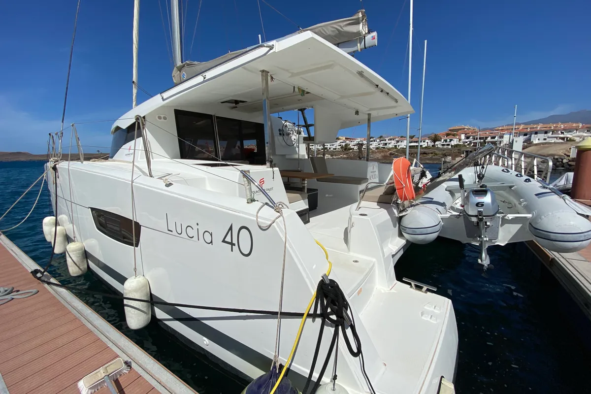 Exterior view of Aquila, a Fountaine Pajot Lucia 40 catamaran at San Miguel de Abona, Spain