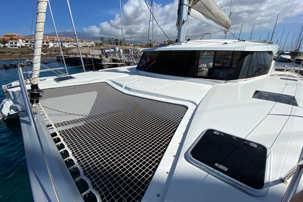 Exterior view of Aquila, a Fountaine Pajot Lucia 40 catamaran at San Miguel de Abona, Spain