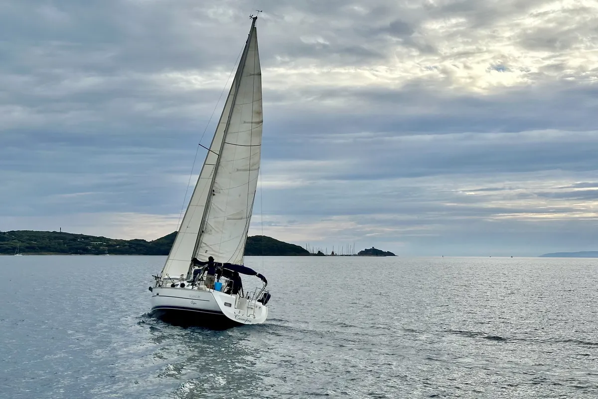 Exterior view of Cassiopea, a Beneteau Oceanis 323 sailboat at Punta Ala, Italy
