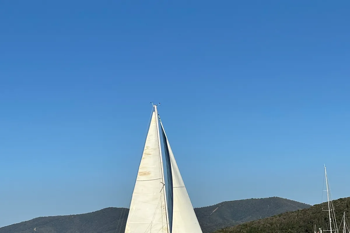 Exterior view of Cassiopea, a Beneteau Oceanis 323 sailboat at Punta Ala, Italy