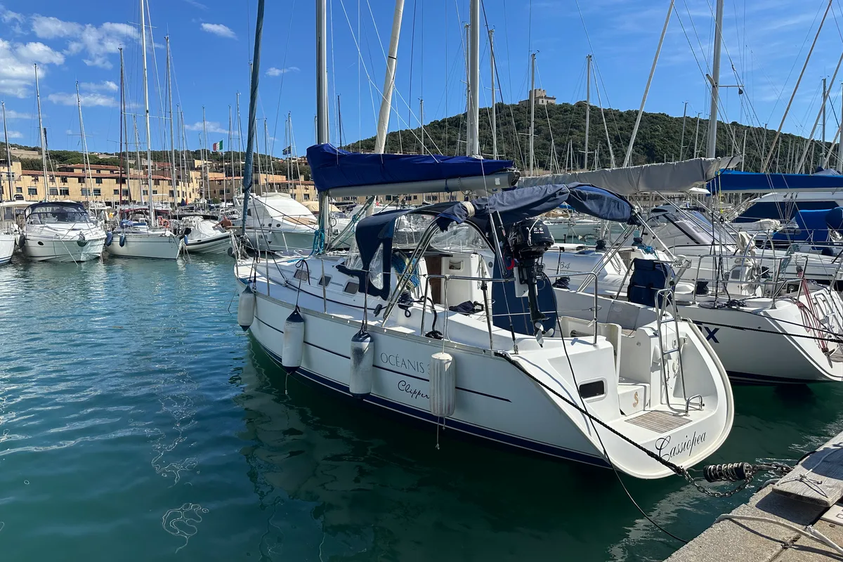 Exterior view of Cassiopea, a Beneteau Oceanis 323 sailboat at Punta Ala, Italy