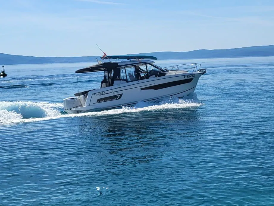 Exterior view of Whiskey, a Jeanneau Merry Fisher 895 motorboat at Novi Vinodolski, Croatia