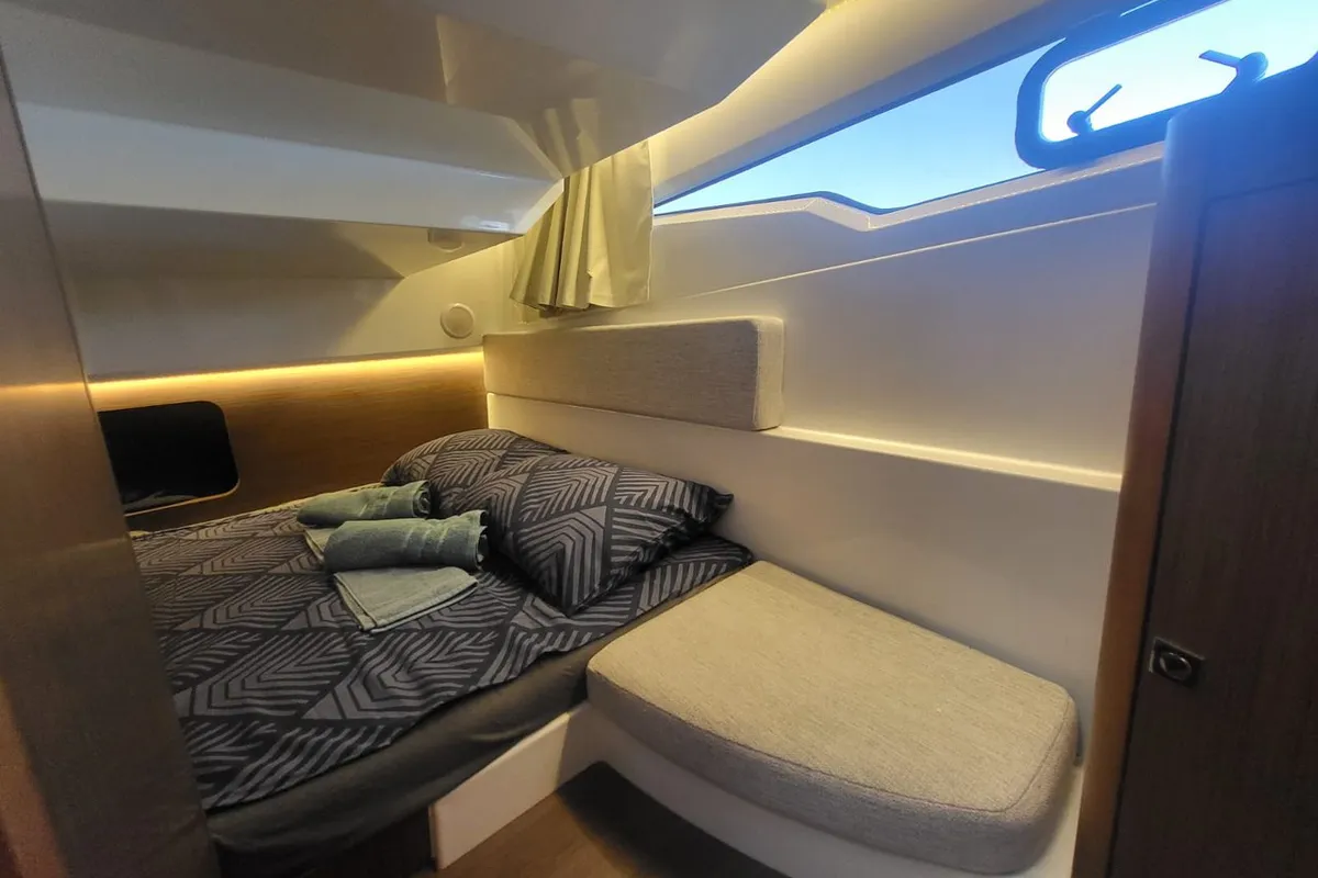 Cabin on Whiskey, a Jeanneau Merry Fisher 895 motorboat at Novi Vinodolski, Croatia