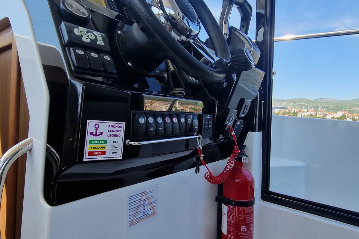 Cockpit of Whiskey, a Jeanneau Merry Fisher 895 motorboat at Novi Vinodolski, Croatia