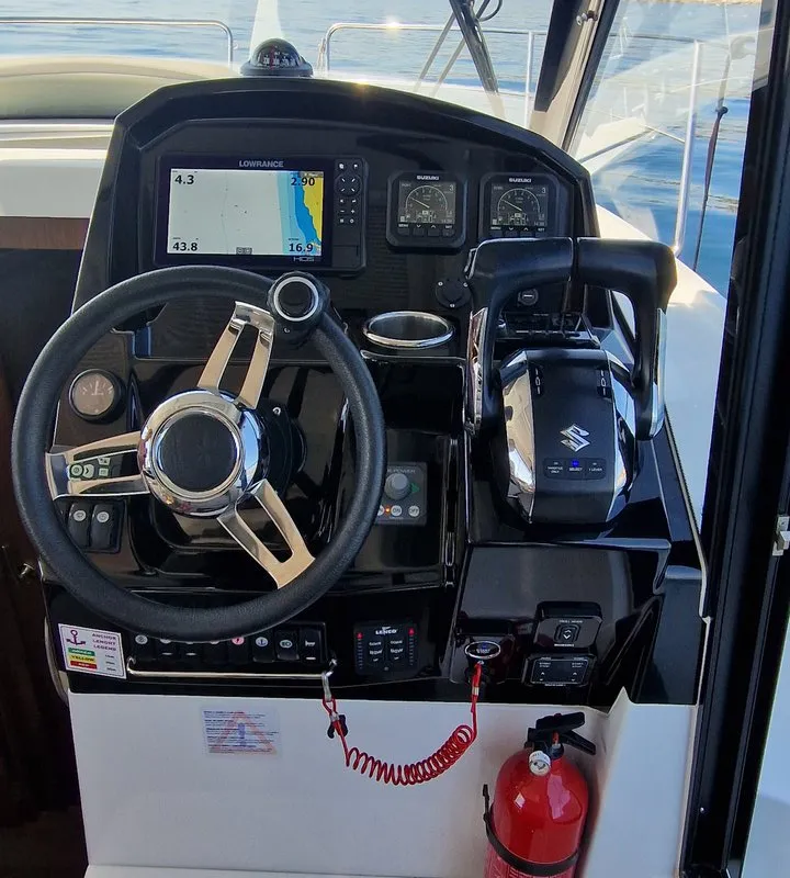 Cockpit of Whiskey, a Jeanneau Merry Fisher 895 motorboat at Novi Vinodolski, Croatia