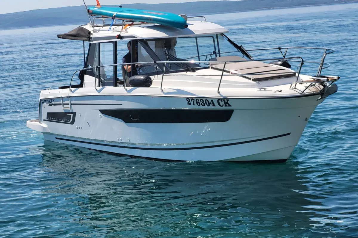 Exterior view of Whiskey, a Jeanneau Merry Fisher 895 motorboat at Novi Vinodolski, Croatia